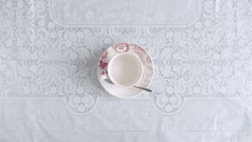 Tea is poured into a teacup - Powered by Shutterstock - Get 15% off with code: PIKWIZARD15