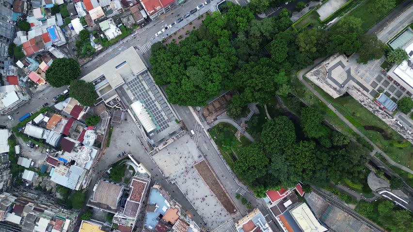 Macau, China: Top down drone footage of the Macau historical district with the ruins of the Saint Paul cathedral and the Monte Fort, home of the Macao museum in the former Portuguese colony