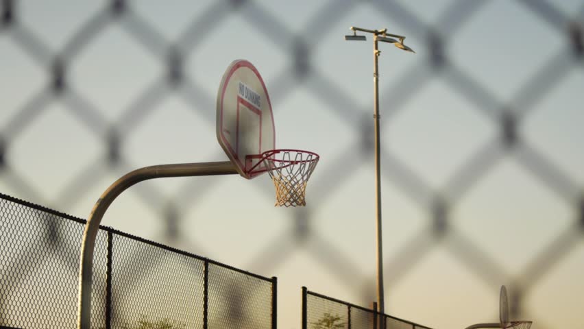 Basketball hoop with ball being shot into the net without touching rim