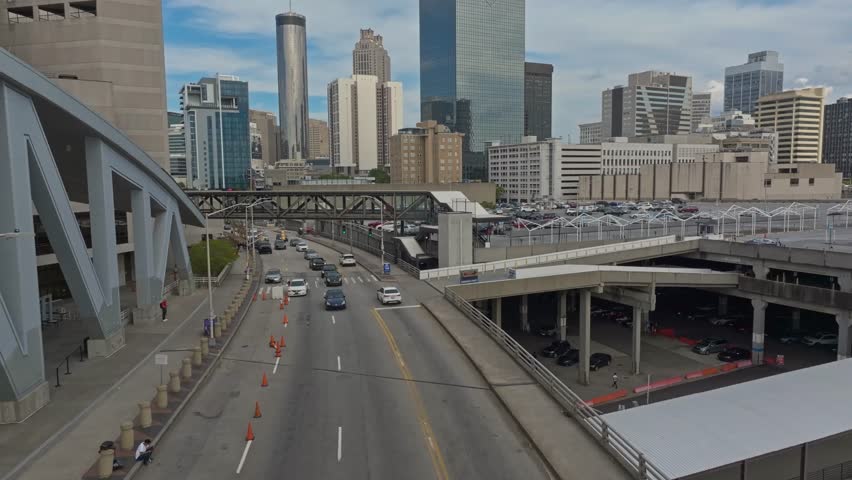 Aerial view of traffic on road in Atlanta City with Skyscraper buildings in background