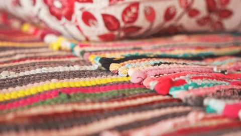 Close up striped color fabric bedouin carpet Stockvideó