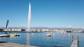 Nice water fall, landscape and architecture of Switzerland. The video shows drone footage of Geneva city of Switzerland. It also shows the  coast area and port.