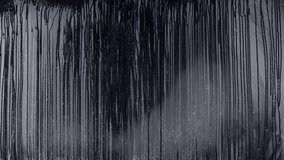 Hooded Evil Figure Window Approach 4K Loop features a hooded figure with a disfigured face approaching out of the darkness to a rain covered window and retreating again in a loop. - Powered by Shutterstock - Get 15% off with code: PIKWIZARD15