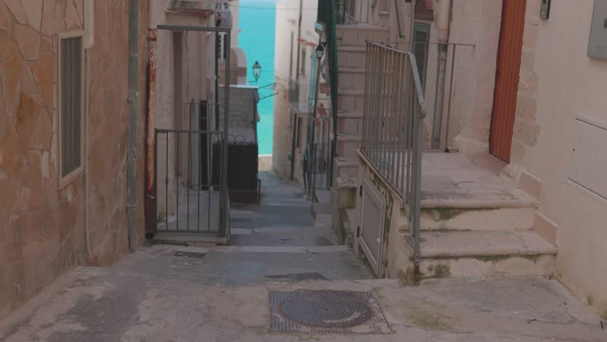 Beautiful cityscape of Vieste, Italy. Narrow streets of Italian town.