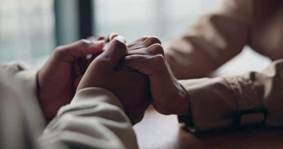 Holding hands, support and couple at table for love, trust and care together after cancer diagnosis. Closeup, man comfort woman and empathy, help in crisis and kindness, connection and hope for faith Royalty-Free Stock Footage #1110219843