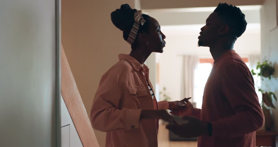 Stress, divorce and couple fight in their home angry or frustrated by liar, cheat or abuse. Marriage, conflict or black people argue about toxic relationship, domestic violence or jealousy or anxiety Royalty-Free Stock Footage #1110219863