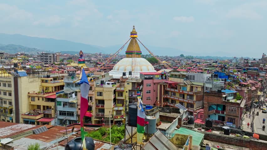 Flying Towards The Bouddha Stupa Buddhist Temple In Kathmandu, Nepal. Aerial Drone Shot