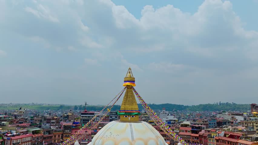 Aerial Towards The Golden Pyramid And The Eyes Boudhanath Stupa In Kathmandu, Nepal, South Asia. 