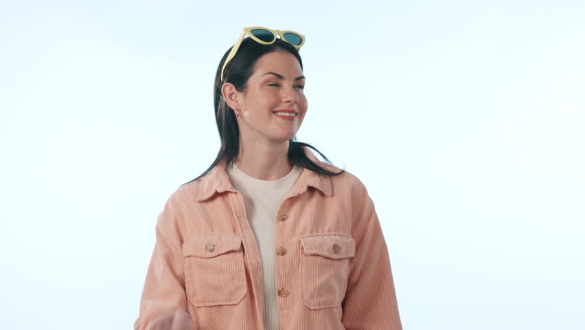 Happy woman, pointing and palm with decision in choice, advertising or marketing against a studio background. Portrait of female person smile with hands out in selection or advertisement on mockup