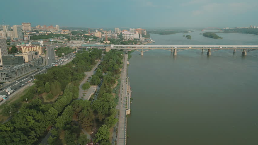 City of Novosibirsk. Russia. Drone view. Ob river. Bridge. River embankment.
