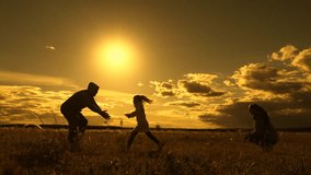 Child runs from mother to father, hugs parents, family game. Happy family, dad spins his daughter in his arms in park under sun. Family walks in park in autumn. Parents, kid in nature. People outdoors - Powered by Shutterstock - Get 15% off with code: PIKWIZARD15