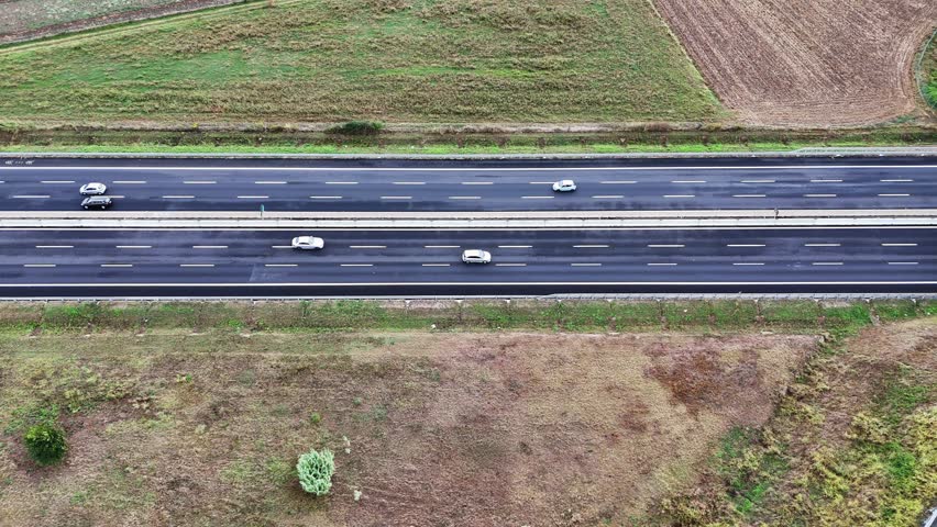 Arial view of Modern transportation with Expressway Road highway Top view. Important infrastructure. Royalty-Free Stock Footage #1110246351