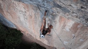 4K footage from young woman pulling rope up after falling in Sant Llorenç del Munt, Barcelona, Spain.
Following camera movement, low angle.