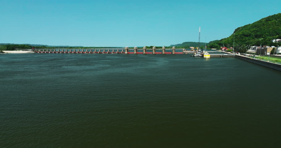 Gates Of Lock and Dam Number 4 On Mississippi River Near Alma In Wisconsin, USA. aerial sideways
