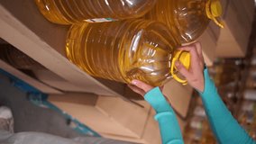 sunflower oil in the supermarket 5 l vertical video - Powered by Shutterstock - Get 15% off with code: PIKWIZARD15