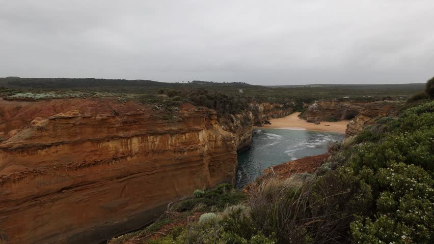 View from Island Arch lookout with Loch Ard Gorge beach in background, Great Ocean Road, southern Australia