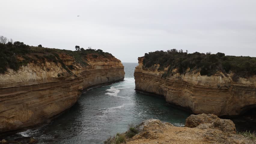 View from Island Arch lookout with Loch Ard Gorge beach in background, Great Ocean Road, southern Australia