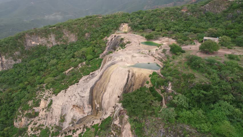 Aerial tilt down shot of Hierve el Agua ponds in Mexico