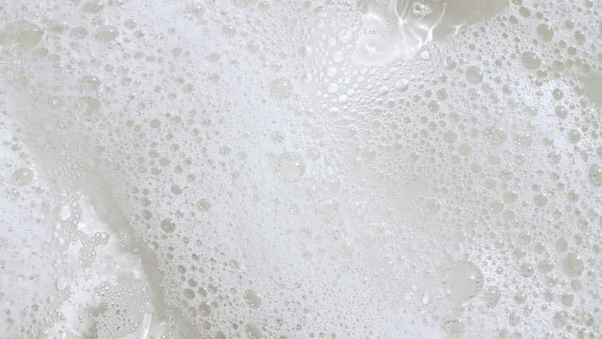 Bubbles of white soap foam. Bathtup Soap Foam. Texture of Soap Foam Bubbles. Natural White Shampoo Bubbles Motion Royalty-Free Stock Footage #1110268527