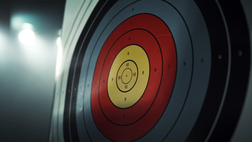 Slow Motion of an Arrow Hitting a Target. Close Up on an Arrow Hitting the Bullseye on a Colorful Board. Talented Athlete Training for a Championship Match. Aesthetic Zoom In Footage Royalty-Free Stock Footage #1110269859