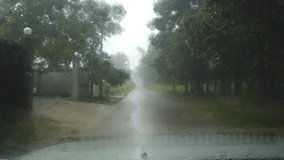 Car driving on the road during a storm in thailand