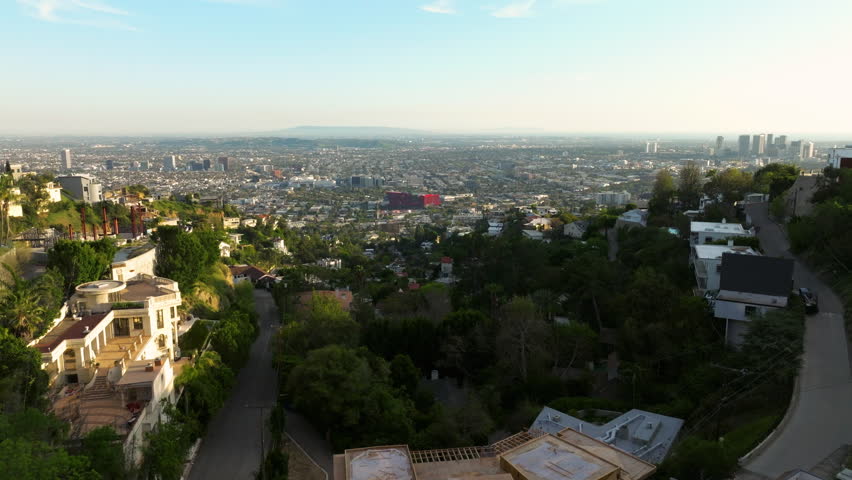 Luxury houses on beautiful address above metropolis. Los Angeles, California, USA. California US, Hollywood Hills. Drone shots of mansions Beverly Hills Hollywood CA. 