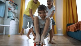 happy family. group of children play with skateboard at home. kids in kindergarten learn to skateboard.Children play on floor at home.Happy children play happily together in kindergarten.games at home - Powered by Shutterstock - Get 15% off with code: PIKWIZARD15