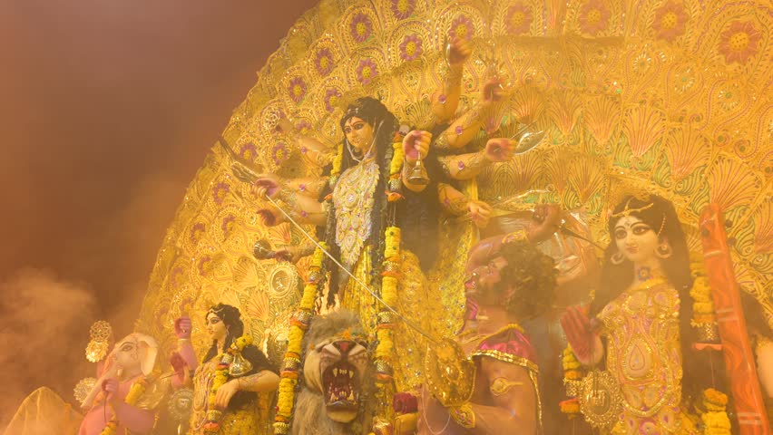 Smoke of Dhunachi, a Bengali incense burner around Goddess Durga idol in a Pandal. Durga Puja festival is the most important Hindu festival celebrated across the world mainly in Kolkata, India.
