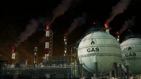 LNG - liquid natural gas heavy industry with storage at night, fictitious - loop video