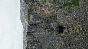 Vertical: Hellmobotn Canyon Up-Close: Steep Paths Panoramic Views and the Intriguing Hellmofjorden - Powered by Shutterstock - Get 15% off with code: PIKWIZARD15