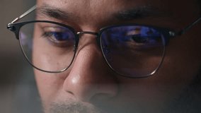 Close up businessman in eyeglasses working with computer data crypto analyzing cropped view male eyes in glasses looking at laptop monitor screen blue light reflection man business programming codding - Powered by Shutterstock - Get 15% off with code: PIKWIZARD15