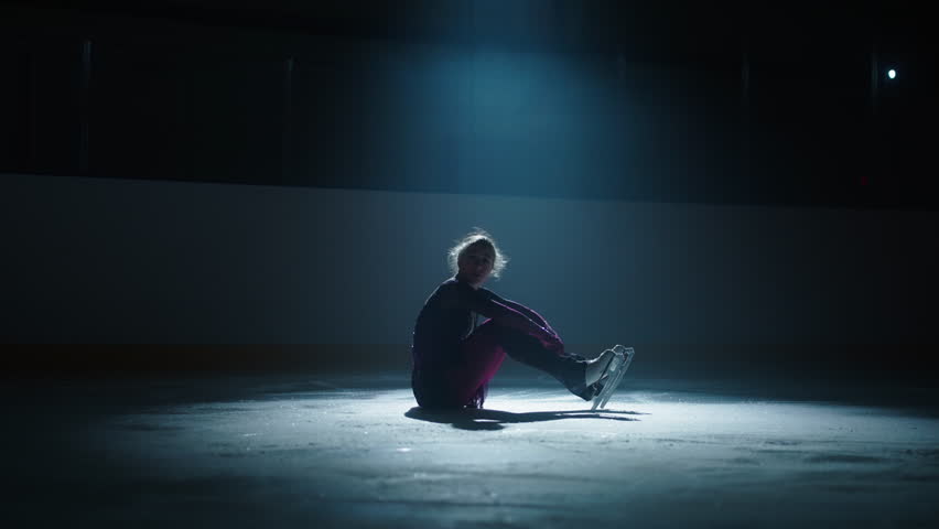 Sad Woman Figure Skater Sitting On Ice After Falling, Disappointed Beginner Sportsperson Feeling Sad Royalty-Free Stock Footage #1110319599