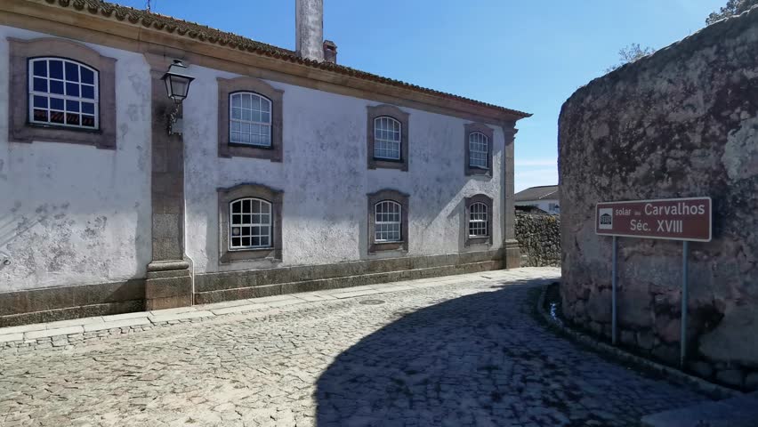 Panoramic exterior view at the iconic Solar dos Carvalhos manor, a 18th century building, on Sernacelhe village downtown, Viseu, Portugal Royalty-Free Stock Footage #1110323233