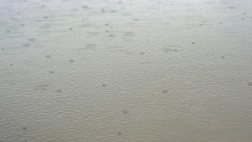 Rain Dropping on  Lake. Rainy Season in Tropical Countries. Tropic Rain in Wet Season. Heavy Rain on Cheow Lan Lake, Khao Sok National Park, Thailand. Relax Water Background Royalty-Free Stock Footage #1110325395