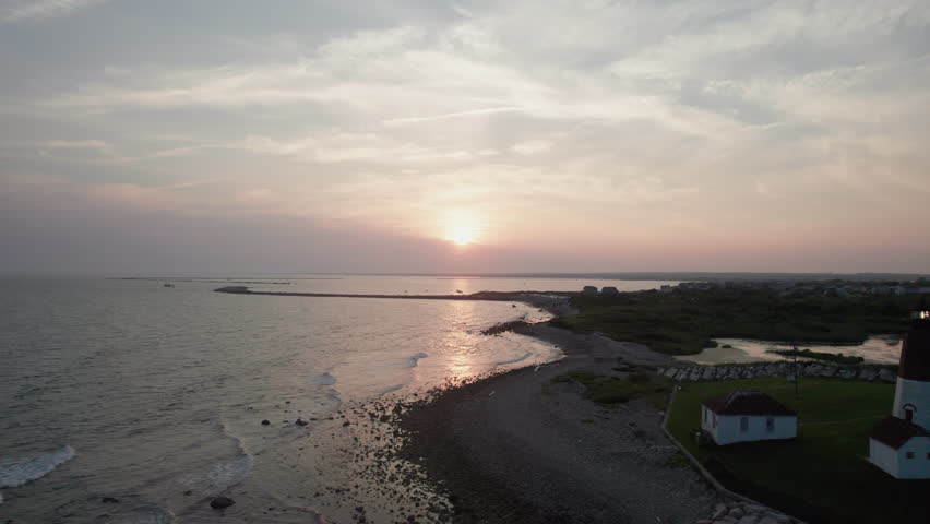 Aerial view at sunset of the coastline and Lighthouse on Narragansett Bay, Rhode Island