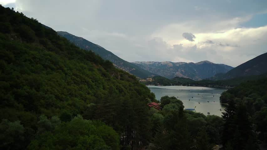 The beach of the bay with clear water. catamarans float on the lake. Aerial drone view, Abruzzo Italy.