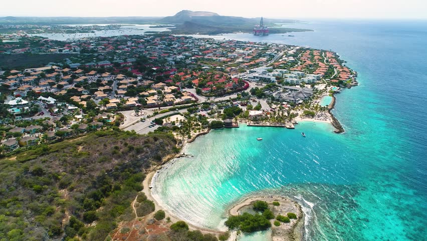 Aerial parallax above Zanzibar beach, Jan Thiel, Curacao on beautiful blue sky day