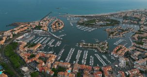 Aerial view of the southern coast of France, the sea coast of city Agde on the Mediterranean Sea with a view of the island of Loisir and its adjacent marinas.Tourist vacation spot