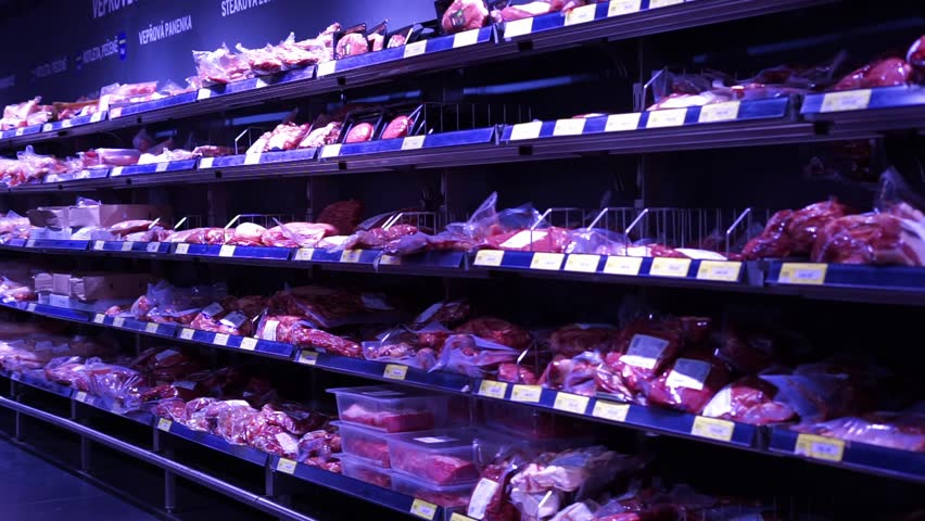 meat in the supermarket display case a lot of meat Royalty-Free Stock Footage #1110344417