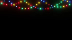light bulb string on black background, Christmas lights colour. - Powered by Shutterstock - Get 15% off with code: PIKWIZARD15