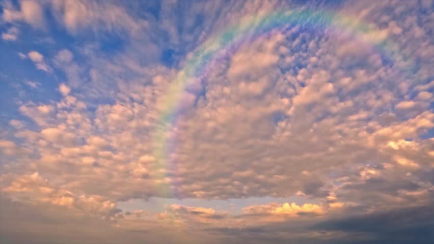 pretty  timelapse of rainbow after rain with clouds - loop video Royalty-Free Stock Footage #1110347783