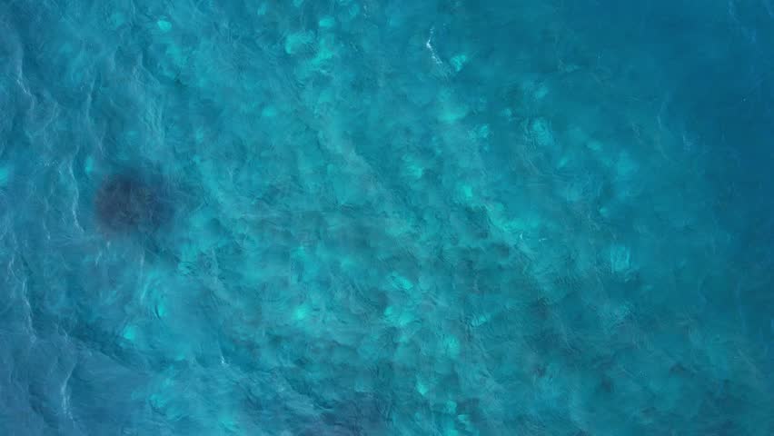 Phuket Thailand Fiji tropical beach Aerial drone top down view bird eye view of sea azure waves pattern. Beautiful of sea water wave come to beach. Sky blue shallow water, paradise copy space concept Royalty-Free Stock Footage #1110348461