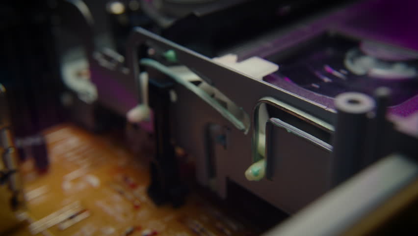 Retro Neon VHS Tape Playing in a VCR Dynamic Dolly Close up - Powered by Shutterstock - Get 15% off with code: PIKWIZARD15