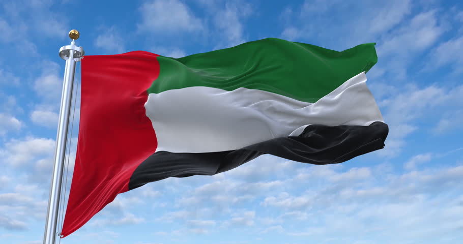 United Arab Emirates flag with flagpole waving in wind, rolling clouds background looping, 4K video (Perfect Loop) Royalty-Free Stock Footage #1110349583