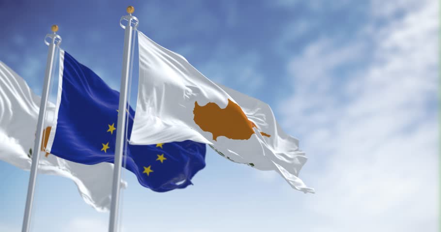Cyprus national flag waving in the wind with the European Union flag on a clear day. Seamless 3d render animation loop. Slow motion. Selective focus