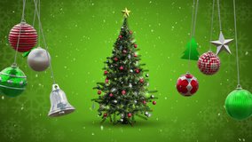 Animation of christmas baubles over christmas tree and snow falling on green background. Christmas, tradition and celebration concept digitally generated video.