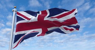 United Kingdom flag with flagpole waving in wind, rolling clouds background looping, 4K video (Perfect Loop)