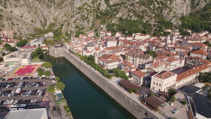 Aerial Kotor City Walls with historic architecture and river, Montenegro