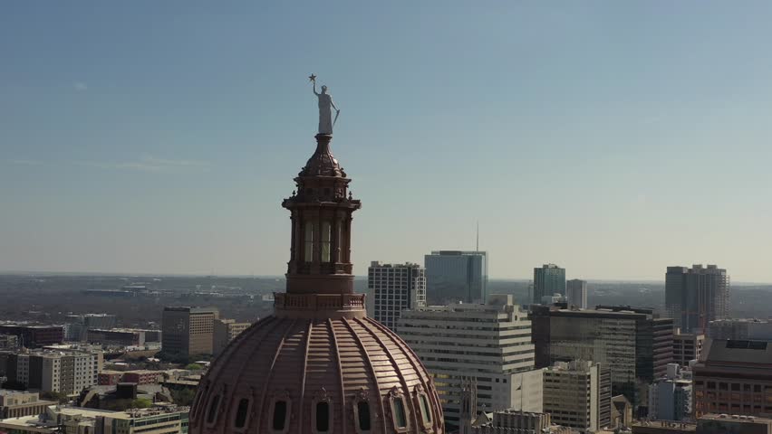 Texas Capitol building aerial pull back