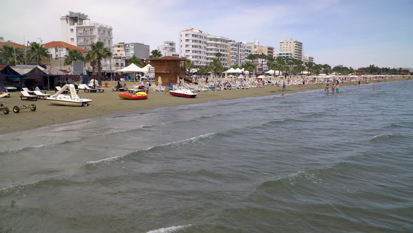 Sandy beach on the Mediterranean sea coast in Larnaca, a city on the south east Cyprus